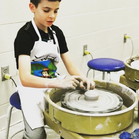 Lucas and Galen Congdon's younger son, Finnegan trying to make a pottery. How many children do the married pair share?